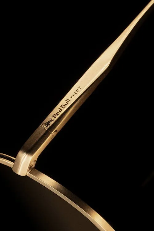 Close-up of elegant gold designer eyeglass frames