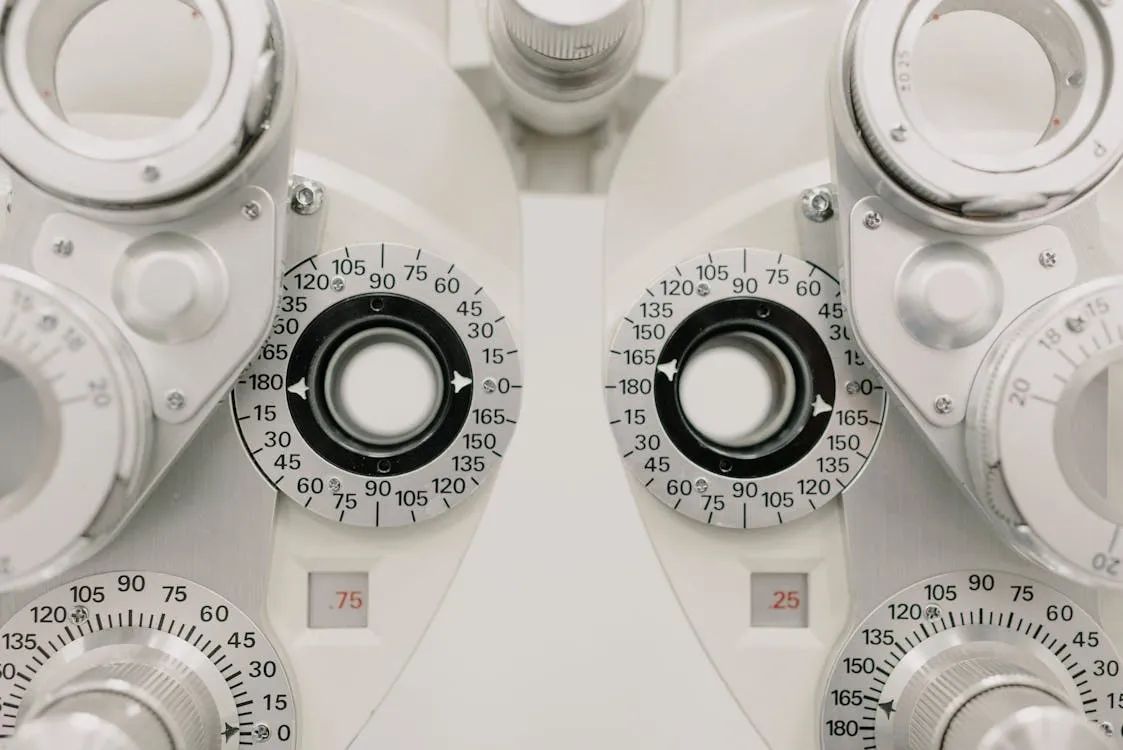 Assortment of glasses frames in different shapes including round, rectangular, and aviator styles for face shape matching